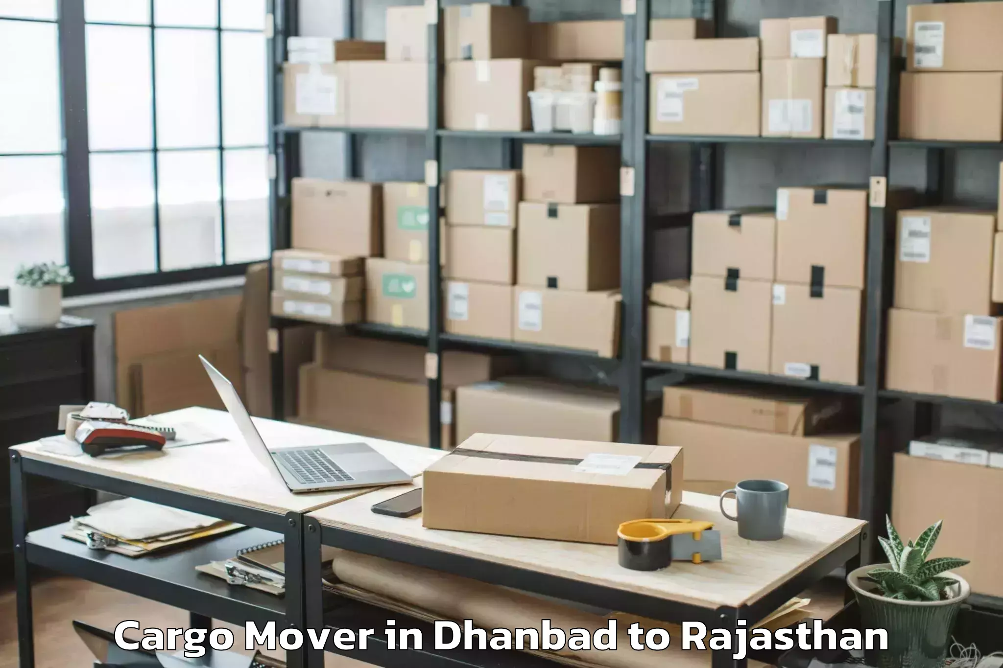 Reliable Dhanbad to Lunkaransar Cargo Mover